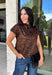 Give your cooler-weather wardrobe a little wild side with this faux suede leopard top from THML. The soft faux suede texture gives the classic animal print a rich seasonal feel that works perfectly as late fall starts turning into winter. A mock neckline adds a polished cold-weather touch, while the short sleeves make it easy to wear on its own or layer underneath a jacket. A keyhole closure at the back finishes the look with a simple detail. 