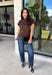 Give your cooler-weather wardrobe a little wild side with this faux suede leopard top from THML. The soft faux suede texture gives the classic animal print a rich seasonal feel that works perfectly as late fall starts turning into winter. A mock neckline adds a polished cold-weather touch, while the short sleeves make it easy to wear on its own or layer underneath a jacket. A keyhole closure at the back finishes the look with a simple detail. 