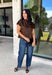 Give your cooler-weather wardrobe a little wild side with this faux suede leopard top from THML. The soft faux suede texture gives the classic animal print a rich seasonal feel that works perfectly as late fall starts turning into winter. A mock neckline adds a polished cold-weather touch, while the short sleeves make it easy to wear on its own or layer underneath a jacket. A keyhole closure at the back finishes the look with a simple detail. 