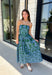 Make a statement this season in this effortlessly beautiful hunter green midi dress! Featuring a light blue abstract print throughout, this strapless silhouette is both timeless and eye-catching. The smocked back bodice offers a comfortable, flattering fit, while the structured zipper closure keeps everything secure. Finished with side pockets and a fully lined design, this cotton midi dress is perfect for fall weddings, dinner dates, and family gatherings.