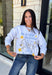 A little western charm and a whole lot of kindness make this sweatshirt an instant favorite! Featuring the playful phrase "Be Rootin', Be Tootin', But Most Of All Be Kind," this heather grey pullover is finished with an abstract illustration of a horse, horseshoe, and stars. The fleece-lined interior keeps you warm and cozy, making it the perfect sweatshirt for everything from weekend errands and football games to bonfires and relaxing at home. 