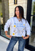 A little western charm and a whole lot of kindness make this sweatshirt an instant favorite! Featuring the playful phrase "Be Rootin', Be Tootin', But Most Of All Be Kind," this heather grey pullover is finished with an abstract illustration of a horse, horseshoe, and stars. The fleece-lined interior keeps you warm and cozy, making it the perfect sweatshirt for everything from weekend errands and football games to bonfires and relaxing at home. 