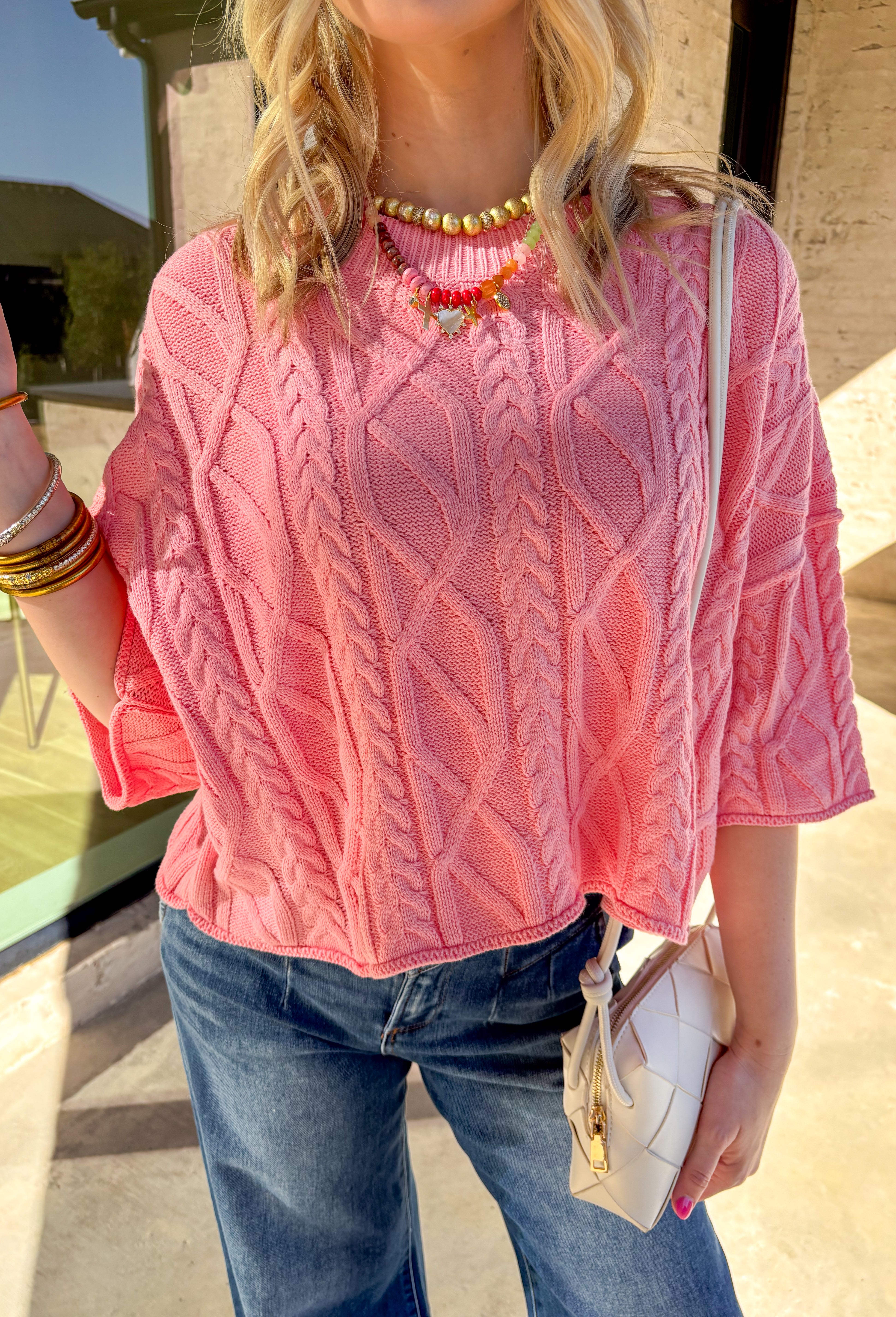 Bright, lightweight, and perfect for spring layering, this coral sweater knit pullover by Entro is an easy go-to for the season. Designed with ¾ length sleeves and a soft knit feel, it offers just the right amount of coverage without feeling heavy. The cheerful coral hue adds a pop of color that instantly refreshes your outfit, making it ideal for sunny days and breezy evenings alike.