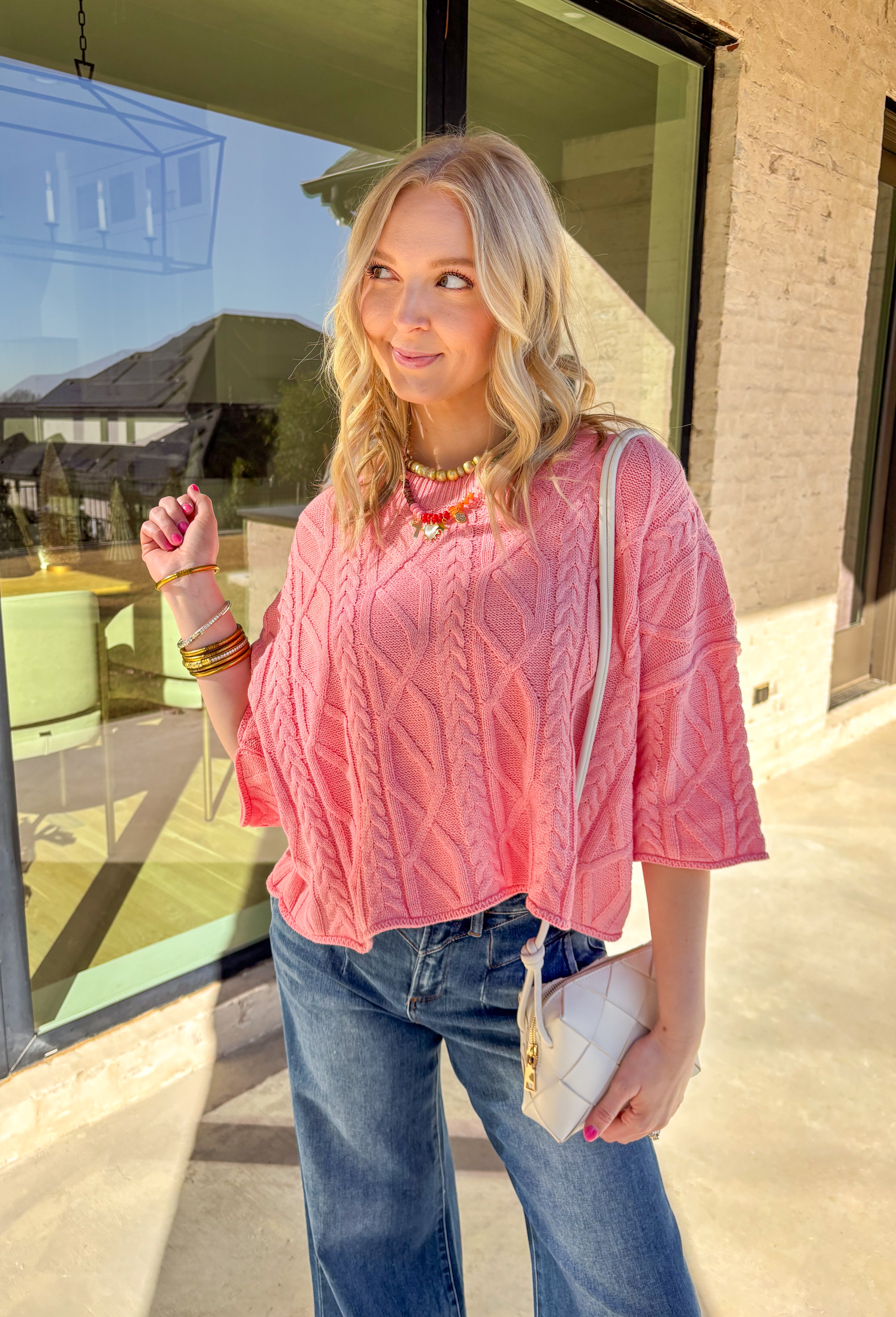 Bright, lightweight, and perfect for spring layering, this coral sweater knit pullover by Entro is an easy go-to for the season. Designed with ¾ length sleeves and a soft knit feel, it offers just the right amount of coverage without feeling heavy. The cheerful coral hue adds a pop of color that instantly refreshes your outfit, making it ideal for sunny days and breezy evenings alike.