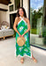 This green floral halter midi dress is such a stunning, easy statement for summer! The blue and cream floral print pops beautifully against the green base, while the contrast cream trim adds a fresh, polished touch. The halter neckline with a self-tie closure gives it that flattering, elevated feel, and the side slits add just the right amount of movement for warm days. Fully lined with side pockets (always a win), it’s perfect for everything from vacation dinners to summer events. 