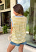 This neutral and mustard stripe top is such a fresh, easy piece for summer! The soft stripe pattern keeps it classic, while the light blue trim along the neckline and sleeves adds the perfect unexpected pop of color. The subtle cap sleeve gives just a little coverage while still keeping it cool and breezy for warm days. Lightweight and easy to style, this is one of those tops you can throw on with denim shorts or white jeans and instantly feel put together. 