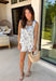 This seashell print two piece set is giving all the coastal summer vibes! The sleeveless white top features a flattering square neckline, while the navy seashell print adds the cutest beachy touch. The matching shorts are just as easy and comfortable with an elastic waistband and adjustable tie for the perfect fit. Made from a lightweight cotton blend, this set is breathable and perfect for warm days—whether you're heading on vacation, running errands, or grabbing lunch by the water. 