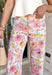 These floral print wide leg pants are such a fun, standout piece for summer! The neutral base paired with pops of pink, green, blue, and orange creates a fresh, colorful look that instantly elevates your outfit. Designed with a flattering wide leg fit, they’re lightweight, breathable, and perfect for warm days when you still want to feel put together. The patch pockets and classic zip fly keep them functional and easy to wear. 