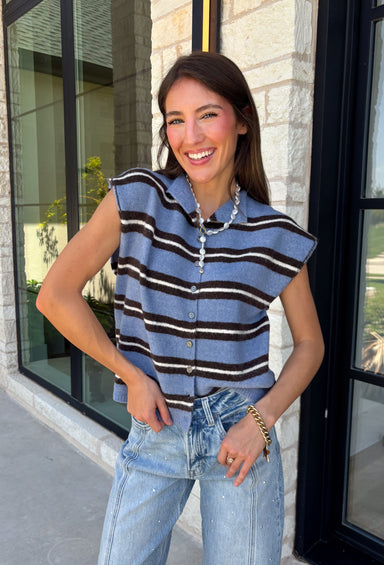 Cozy meets colorful in this sweater cardigan that's made for fall. Featuring a sky blue, black, and crisp white stripes, this soft knit adds the perfect pop of seasonal color to your wardrobe. The button front gives you the option to wear it open as a layering piece or buttoned up as a sweater, making it a versatile staple you'll reach for again and again. Finished with cap sleeves and a cozy knit feel, it's perfect for everything from workdays to weekend coffee dates and all your autumn adventures.