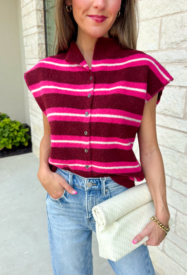 Cozy meets colorful in this sweater cardigan that's made for fall. Featuring rich burgundy, vibrant fuchsia, and crisp white stripes, this soft knit adds the perfect pop of seasonal color to your wardrobe. The button front gives you the option to wear it open as a layering piece or buttoned up as a sweater, making it a versatile staple you'll reach for again and again.