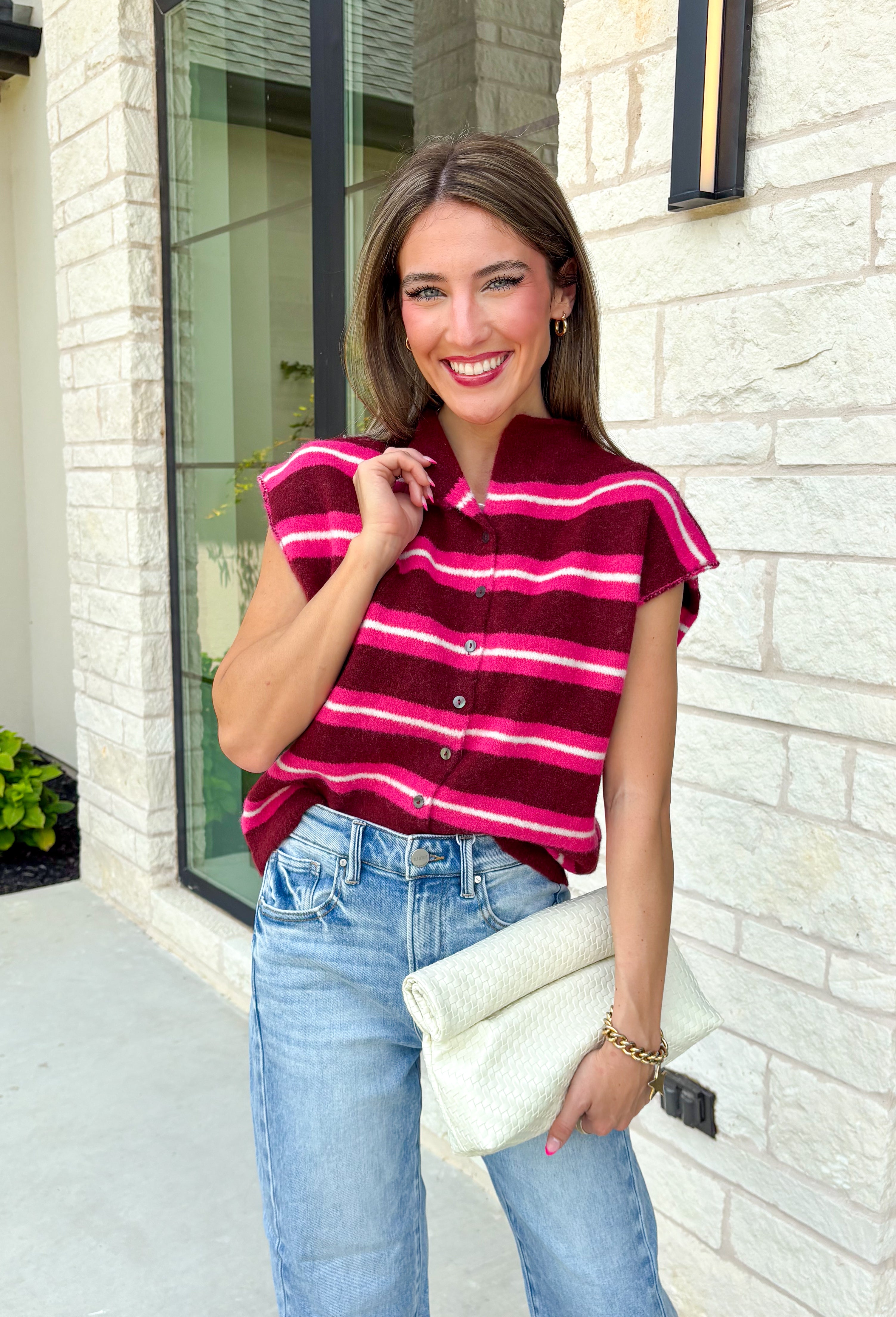 Cozy meets colorful in this sweater cardigan that's made for fall. Featuring rich burgundy, vibrant fuchsia, and crisp white stripes, this soft knit adds the perfect pop of seasonal color to your wardrobe. The button front gives you the option to wear it open as a layering piece or buttoned up as a sweater, making it a versatile staple you'll reach for again and again.