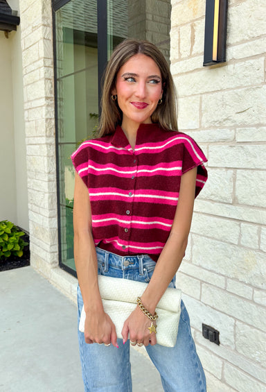 Cozy meets colorful in this sweater cardigan that's made for fall. Featuring rich burgundy, vibrant fuchsia, and crisp white stripes, this soft knit adds the perfect pop of seasonal color to your wardrobe. The button front gives you the option to wear it open as a layering piece or buttoned up as a sweater, making it a versatile staple you'll reach for again and again.