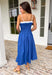 Easy, breezy, and made for sunshine-filled days! This blue sleeveless midi dress features crisp white trim along the top for a fresh pop of contrast that keeps the look clean and classic. Adjustable straps allow you to customize the fit, while smocking at the waist and back creates a flattering shape with comfortable stretch. The lightweight cotton fabric keeps it breathable, and of course it has side pockets — because we know that’s a must. Fully lined for easy wear.