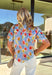 Light, cheerful, and made for sunny days, this light blue button-down top by Umgee is a springtime favorite. Featuring a colorful floral print in shades of green, mustard, and pink, this top brings an easy pop of color to your everyday wardrobe. The collared neckline keeps it classic, while the scalloped sleeves add a sweet, feminine touch that feels perfect for the season.