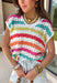 This open knit sweater tank is made for sunshine and warm days ahead. Designed in a soft off-white base with pops of orange, pink, blue, green, and red woven throughout, it brings just the right amount of playful color to your look. The breathable open knit design keeps it light and airy, making it perfect for layering over a bralette or tank when temperatures rise. Easy, effortless, and full of personality, this piece is a go-to for casual spring and summer styling.