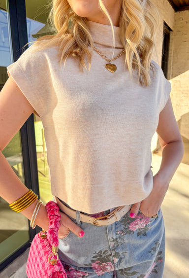 Layer up in style with this oatmeal mock neck knit pullover—it’s the perfect piece for crisp autumn days. With a soft, stretchy feel and a flattering mock neckline, it’s made for layering under shackets, jackets, or worn solo with your favorite jeans. It’s a wardrobe essential that feels just as good as it looks.