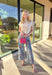 Fresh, playful, and made to stand out, this wide leg denim by Entro brings a fun spring twist to your everyday jeans. Featuring a pink floral print throughout, these jeans feel cheerful and unique while still being easy to style. The wide leg silhouette adds a relaxed, on-trend fit that pairs perfectly with simple tees, lightweight knits, and spring blouses.