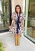 This navy floral dress is giving fall fabulous in the best way. With bold neutral blooms in cream, tan, teal, and brown, it’s the kind of that's perfect for any special occasion. The button-down design and matching self-tie waist keep things polished, while puff sleeves and navy trim down the front add a little extra charm.&nbsp;