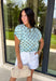 This light blue polka dot top is such a fun twist on a classic summer staple! The soft blue base paired with brown polka dots gives it a playful, slightly unexpected vibe that still feels easy to wear every day. The elastic cuff sleeves create a subtle puff sleeve shape that adds a feminine touch without being over the top. Made from breathable cotton, it’s perfect for warm days when you want something cute and comfortable. 