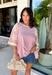 This mauve star print tee is the perfect mix of casual and cute for summer days! The soft mauve base paired with cream stars gives it a playful, laid-back vibe, while the embroidered details add that extra touch that makes it feel special. The contrast cream neckline and sleeves keep it fresh, and the exposed hem in the back adds a subtle, cool detail. Made from breathable cotton, it’s an easy throw-on piece for everything from errands to relaxed weekends. 