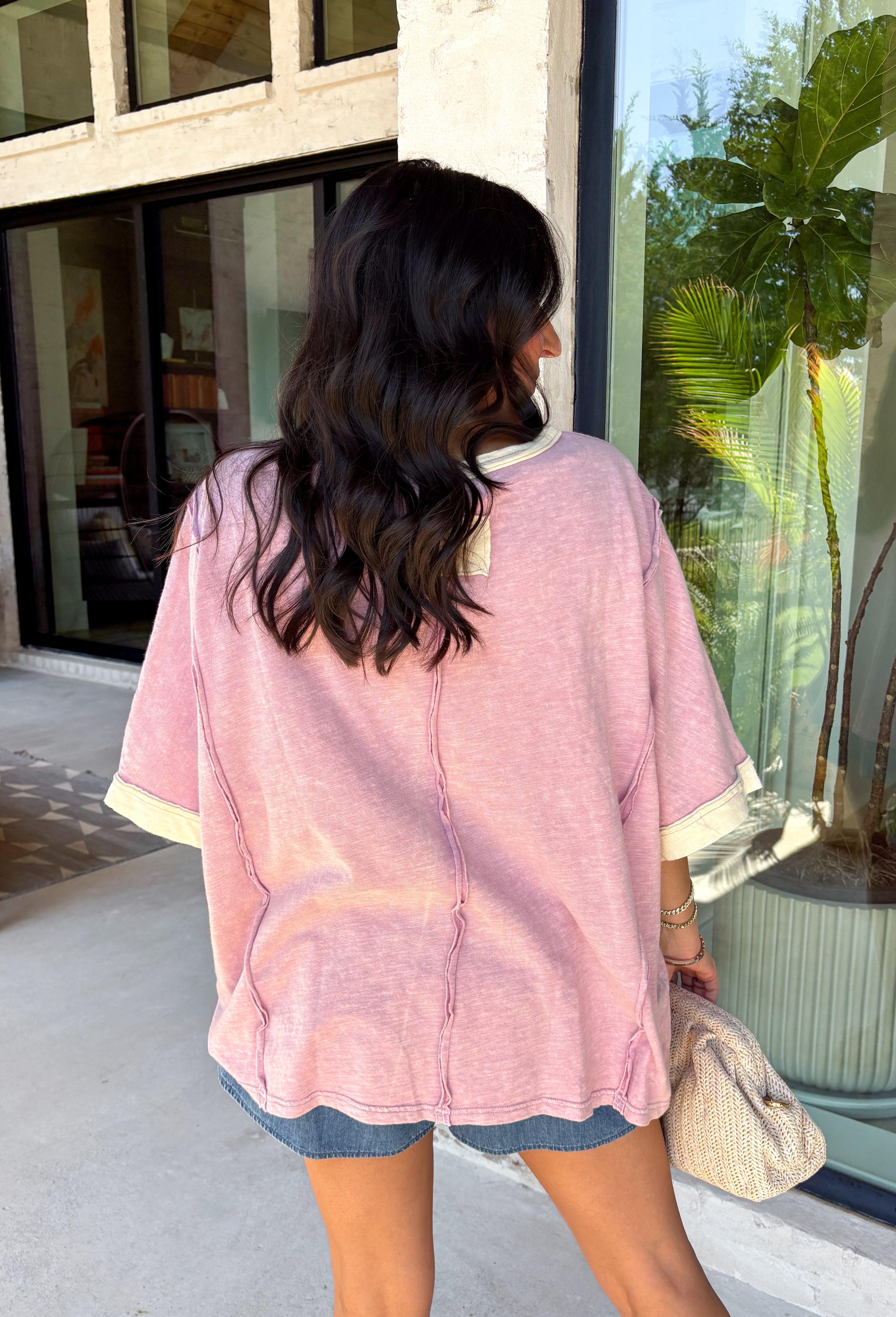 This mauve star print tee is the perfect mix of casual and cute for summer days! The soft mauve base paired with cream stars gives it a playful, laid-back vibe, while the embroidered details add that extra touch that makes it feel special. The contrast cream neckline and sleeves keep it fresh, and the exposed hem in the back adds a subtle, cool detail. Made from breathable cotton, it’s an easy throw-on piece for everything from errands to relaxed weekends. 