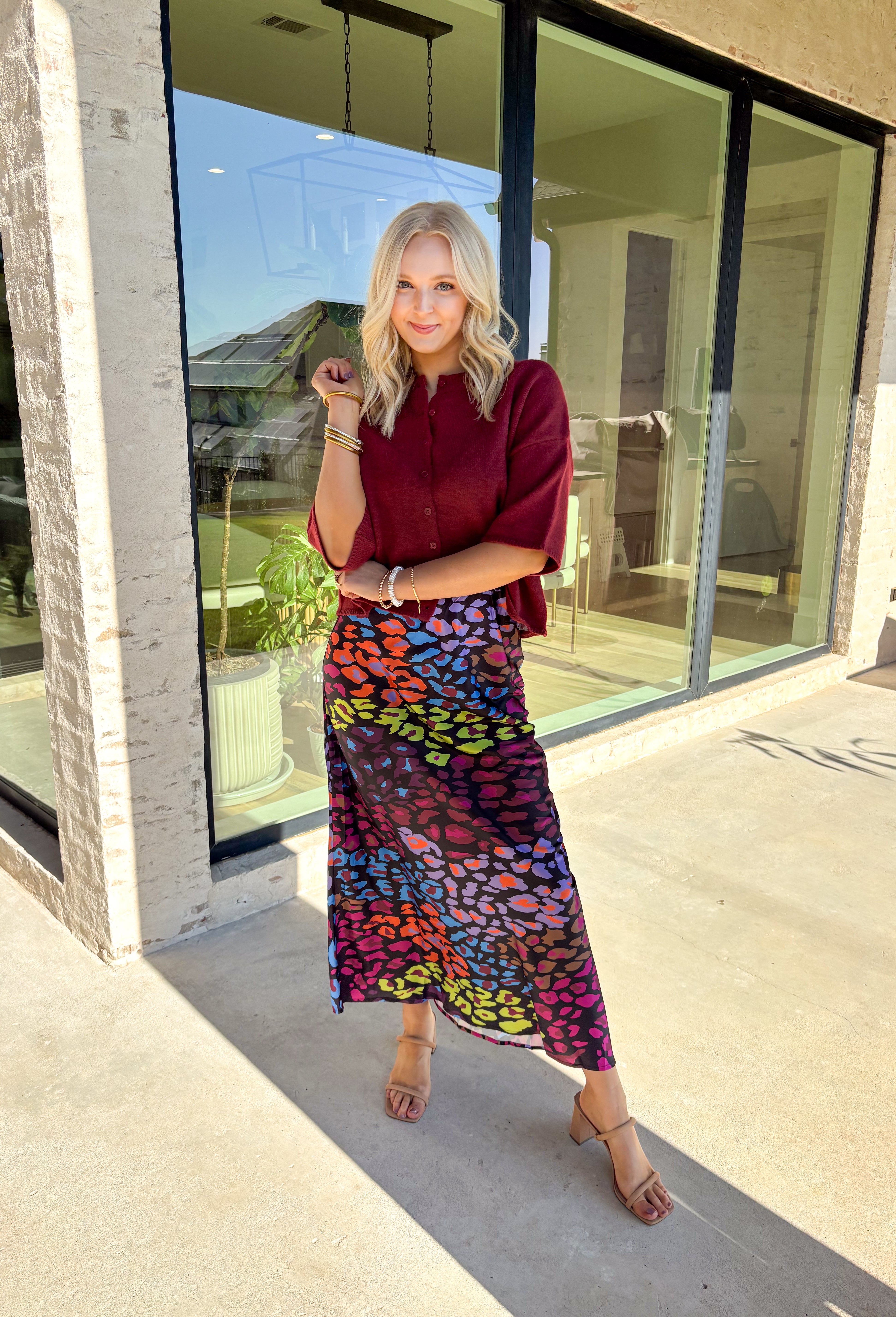 Cozy up in style with this burgundy sweater knit top—designed with a button-front closure and wide ¾ length sleeves for an effortlessly relaxed feel. The rich autumn hue makes it perfect for layering all season long, whether you're grabbing a pumpkin latte or heading into the office. Trust us, this one’s as comfy as it is cute!