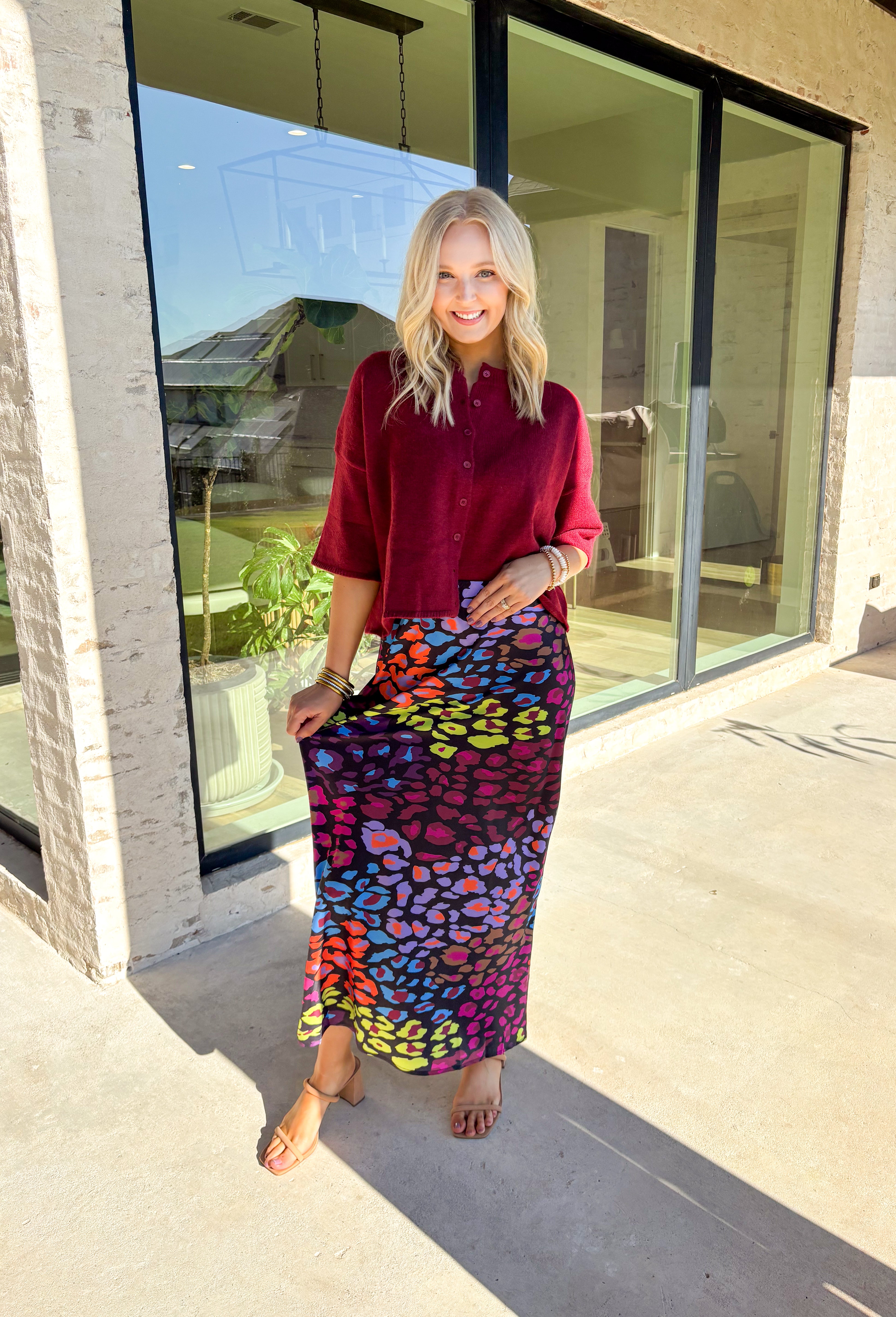 Cozy up in style with this burgundy sweater knit top—designed with a button-front closure and wide ¾ length sleeves for an effortlessly relaxed feel. The rich autumn hue makes it perfect for layering all season long, whether you're grabbing a pumpkin latte or heading into the office. Trust us, this one’s as comfy as it is cute!