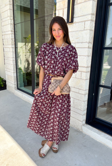 Effortlessly coordinated and beautifully feminine, this matching set is made for all your favorite fall occasions! Featuring a rich maroon hue with delicate off white floral embroidery, this two-piece outfit makes getting dressed easy while still looking polished. The short sleeve top is finished with a comfortable elastic hem, while the coordinating midi skirt features an elastic waistband for an easy, flattering fit. 