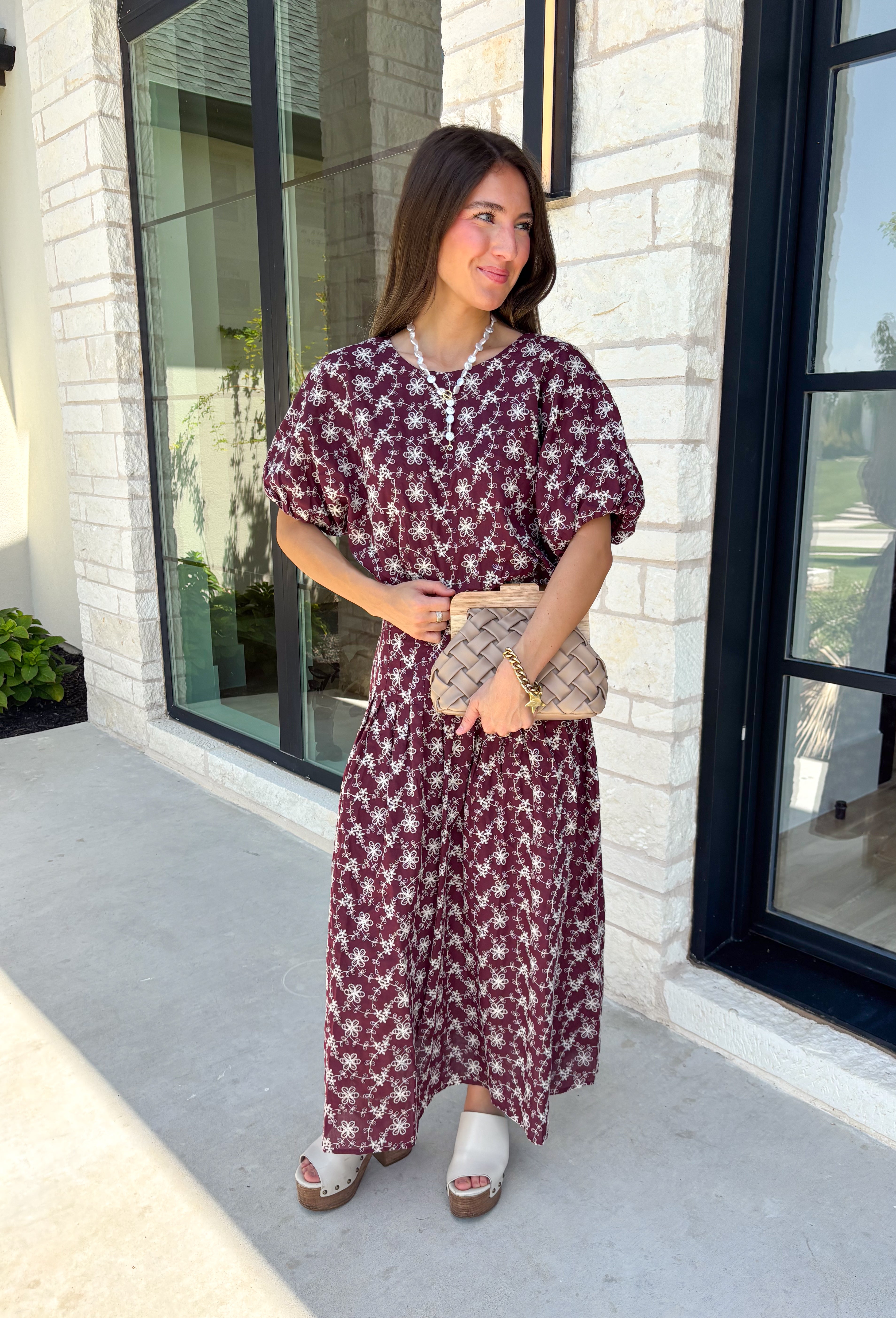 Effortlessly coordinated and beautifully feminine, this matching set is made for all your favorite fall occasions! Featuring a rich maroon hue with delicate off white floral embroidery, this two-piece outfit makes getting dressed easy while still looking polished. The short sleeve top is finished with a comfortable elastic hem, while the coordinating midi skirt features an elastic waistband for an easy, flattering fit. 