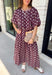 Effortlessly coordinated and beautifully feminine, this matching set is made for all your favorite fall occasions! Featuring a rich maroon hue with delicate off white floral embroidery, this two-piece outfit makes getting dressed easy while still looking polished. The short sleeve top is finished with a comfortable elastic hem, while the coordinating midi skirt features an elastic waistband for an easy, flattering fit. 