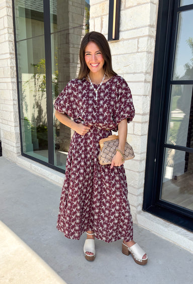 Effortlessly coordinated and beautifully feminine, this matching set is made for all your favorite fall occasions! Featuring a rich maroon hue with delicate off white floral embroidery, this two-piece outfit makes getting dressed easy while still looking polished. The short sleeve top is finished with a comfortable elastic hem, while the coordinating midi skirt features an elastic waistband for an easy, flattering fit. 