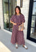 Effortlessly coordinated and beautifully feminine, this matching set is made for all your favorite fall occasions! Featuring a rich maroon hue with delicate off white floral embroidery, this two-piece outfit makes getting dressed easy while still looking polished. The short sleeve top is finished with a comfortable elastic hem, while the coordinating midi skirt features an elastic waistband for an easy, flattering fit. 