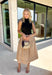 Sophisticated style meets everyday comfort in this stunning mixed media midi dress! Featuring a sleek black mock neck bodice paired with a beautifully flowing tan skirt, this dress creates an effortlessly polished look that's perfect for the season ahead. Finished with a back zipper closure and a fully lined skirt, this versatile dress is ready for everything from office meetings and brunch dates to fall weddings and special occasions.