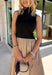 Sophisticated style meets everyday comfort in this stunning mixed media midi dress! Featuring a sleek black mock neck bodice paired with a beautifully flowing tan skirt, this dress creates an effortlessly polished look that's perfect for the season ahead. Finished with a back zipper closure and a fully lined skirt, this versatile dress is ready for everything from office meetings and brunch dates to fall weddings and special occasions.