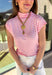 Fresh, fun, and perfect for spring styling, this pink and off-white striped mock neck top by Entro is an easy favorite for the season. Designed with cap sleeves and a lightweight feel, it’s great for warm days while still offering a little extra coverage. The cropped length gives it a modern, on-trend look that pairs perfectly with high-waisted denim, skirts, or trousers.