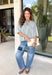 This light grey cardigan is the perfect layering piece for the season ahead! The soft knit and timeless button down design make it a wardrobe staple you'll reach for again and again. A crisp white stripe along the sleeves adds a subtle varsity-inspired touch, while the ribbed hem and sleeve cuffs create a polished finish. Wear it buttoned as a sweater or layered over your favorite basics for endless styling possibilities.