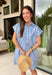 This light blue stripe dress is the kind of easy, polished piece you’ll reach for all summer long! The navy stripe print keeps it classic, while the collared v-neckline adds a slightly elevated touch that still feels effortless. With cuffed sleeves and a front pocket, it has that relaxed, everyday feel—plus side pockets (always a win). Made from breathable cotton and fully lined, it’s comfortable enough for all-day wear. From errands to lunch plans, this dress makes getting ready simple. 