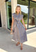 Rich autumn hues and timeless details make this striped midi dress an easy favorite for the season ahead. Featuring light blue and brown stripes, this dress captures everything we love about fall. The flattering v-neckline is finished with a sweet self-tie detail, while the gathered waist creates a feminine silhouette that's both comfortable and flattering. Cap sleeves, side pockets, and a fully lined design make it as practical as it is stylish. 
