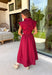 Rich autumn hues and timeless details make this striped midi dress an easy favorite for the season ahead. Featuring warm red and brown stripes, this dress captures everything we love about fall. The flattering v-neckline is finished with a sweet self-tie detail, while the gathered waist creates a feminine silhouette that's both comfortable and flattering. Cap sleeves, side pockets, and a fully lined design make it as practical as it is stylish. 