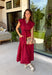 Rich autumn hues and timeless details make this striped midi dress an easy favorite for the season ahead. Featuring warm red and brown stripes, this dress captures everything we love about fall. The flattering v-neckline is finished with a sweet self-tie detail, while the gathered waist creates a feminine silhouette that's both comfortable and flattering. Cap sleeves, side pockets, and a fully lined design make it as practical as it is stylish. 