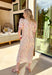 Say hello to your new go-to spring dress! This off white botanical midi dress by Entro is sprinkled with the prettiest floral pops of pink, yellow, and green for the ultimate fresh-picked feel. The ruffled band collar and v-neckline add a sweet, feminine touch, while the button-front design and side pockets keep it practical (because cute AND functional is the goal). Fully lined and easy to wear from brunch to special occasions to weekend plans!