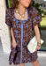 Bring timeless elegance to your fall wardrobe with this beautifully detailed dress from Entro. Designed with a rich brown backdrop and a stunning blue floral print, this feminine dress is full of eye-catching seasonal charm. The flattering square neckline is accented with beautiful blue contrast trim, while the pleated waist creates a flattering, defined silhouette. 