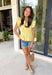 This pastel yellow top is pure sunshine in your summer wardrobe! The soft color feels fresh and cheerful, while the elastic waist creates a flattering, easy shape that’s comfortable for all-day wear. The ruffle sleeves add a feminine touch, and the v-neckline keeps it light and breezy for warm days. Made from breathable cotton, it’s perfect for everything from casual outings to lunch with friends. Pair it with white denim or shorts for an effortlessly bright look—this one is an instant mood booster.