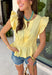 This pastel yellow top is pure sunshine in your summer wardrobe! The soft color feels fresh and cheerful, while the elastic waist creates a flattering, easy shape that’s comfortable for all-day wear. The ruffle sleeves add a feminine touch, and the v-neckline keeps it light and breezy for warm days. Made from breathable cotton, it’s perfect for everything from casual outings to lunch with friends. Pair it with white denim or shorts for an effortlessly bright look—this one is an instant mood booster.