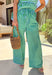 These green and light blue striped wide leg pants are giving effortless spring comfort in the cutest way. The lightweight cotton fabric keeps them breathable for warm days, while the relaxed wide leg fit makes them feel easy and flowy (aka the kind of pants you’ll want to live in). Finished with an elastic waistband and adjustable drawstring, they’re perfect for everything from weekend errands to casual brunch. Pair it with the matching top for the cutest set.