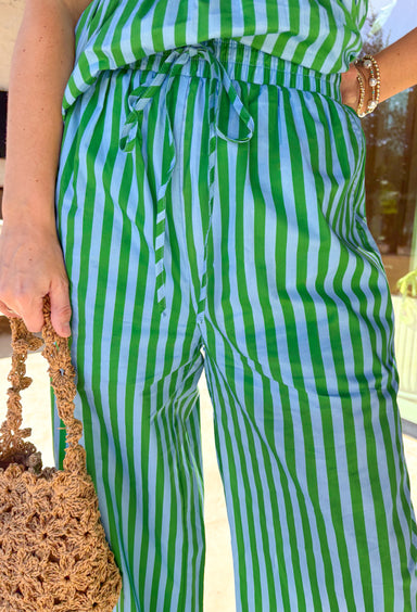 These green and light blue striped wide leg pants are giving effortless spring comfort in the cutest way. The lightweight cotton fabric keeps them breathable for warm days, while the relaxed wide leg fit makes them feel easy and flowy (aka the kind of pants you’ll want to live in). Finished with an elastic waistband and adjustable drawstring, they’re perfect for everything from weekend errands to casual brunch. Pair it with the matching top for the cutest set.
