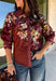 Bring a little fall color into your workweek with this burgundy floral blouse from Current Air. The rich burgundy background is covered in a seasonal floral print, while contrasting stripe trim throughout gives the design a fresh, eye-catching finish. A collared neckline and button-down front keep the look classic and work-ready, with ¾ length sleeves making it an easy choice for transitioning into cooler days. 