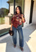 Bring a little fall color into your workweek with this burgundy floral blouse from Current Air. The rich burgundy background is covered in a seasonal floral print, while contrasting stripe trim throughout gives the design a fresh, eye-catching finish. A collared neckline and button-down front keep the look classic and work-ready, with ¾ length sleeves making it an easy choice for transitioning into cooler days. 