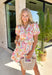 This floral puff sleeve dress is the kind of piece that makes summer styling feel so easy! Designed with a soft neutral base and pops of pink, green, orange, and periwinkle, it brings just the right amount of color while still feeling wearable for everyday plans. The flattering v-neckline and button front add a classic touch, while the puff sleeves and elastic openings give it that feminine shape everyone loves. And yes—side pockets make it even better.  