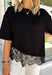 Elevate your everyday fall wardrobe with this effortlessly chic knit top! Crafted from a soft, comfortable knit, this versatile piece is finished with a beautiful scalloped lace hem that adds just the right amount of feminine detail. The classic black color makes it easy to style with everything from denim to printed bottoms, while the trendy silhouette transitions seamlessly from the office to dinner plans. 